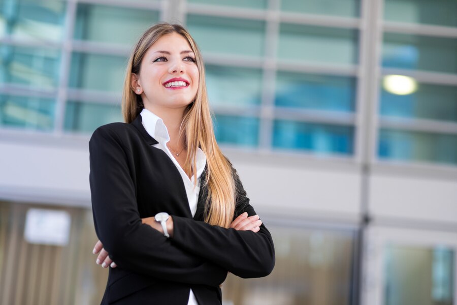 confident-young-female-manager-outdoor-modern-urban-setting_53419-7519