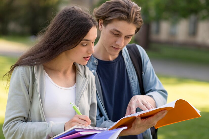 group-teenagers-discussing-project-together_23-2148586582