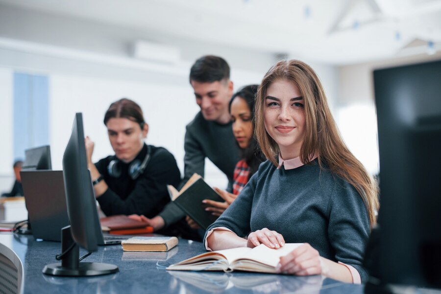 positive-mood-group-young-people-casual-clothes-working-modern-office_146671-16437