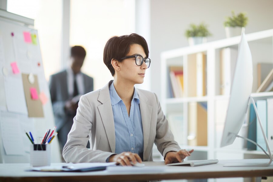 young-woman-desk-office_236854-16987